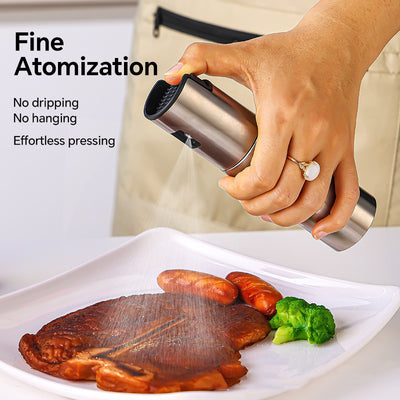 Hand using a pepper grinder over cooked meat and vegetables on a plate with text about fine atomization.